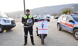 Eğitim alanlara kaskları verildi