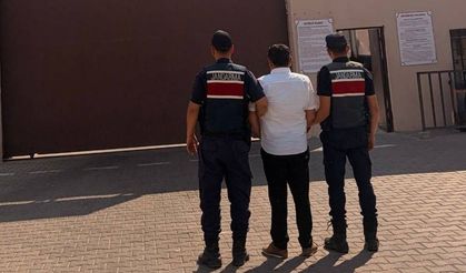 Cinayet suçundan aranıyordu