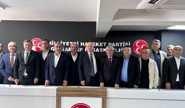 MHP'de rozetler takıldı