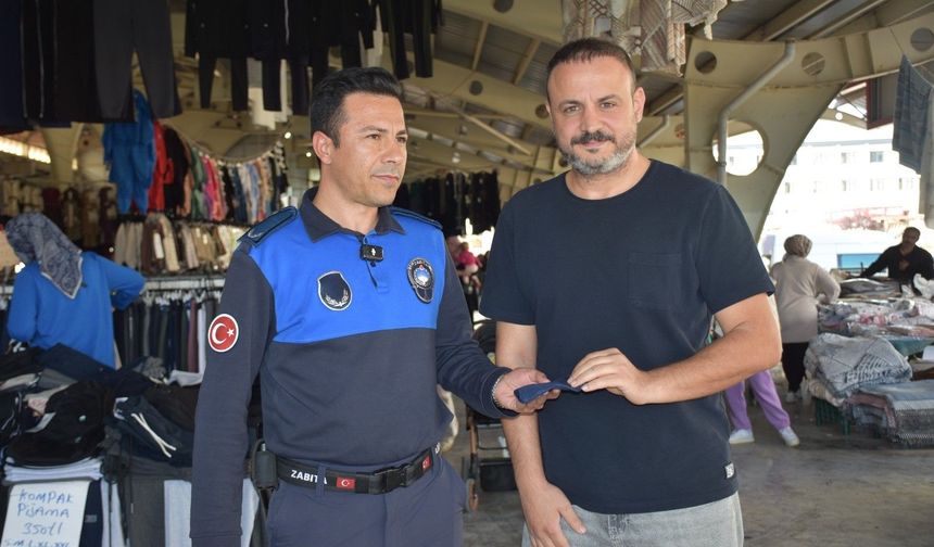 Pazarda bulunan cüzdandan hatıralar çıktı
